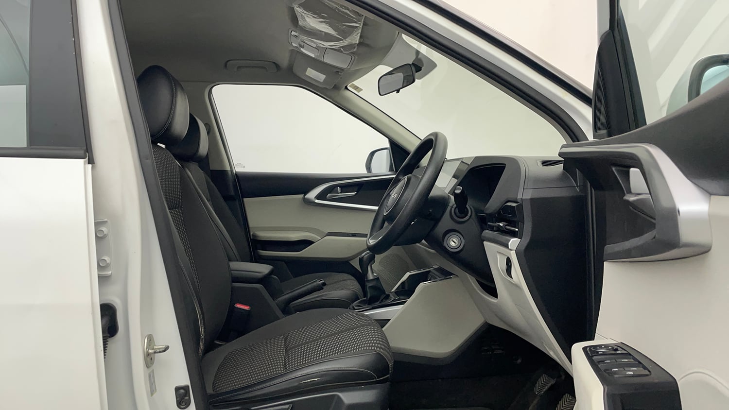 Used 2022 Kia Carens Prestige 1.4 Petrol MT 7 STR Petrol Manual interior RIGHT SIDE FRONT DOOR CABIN VIEW