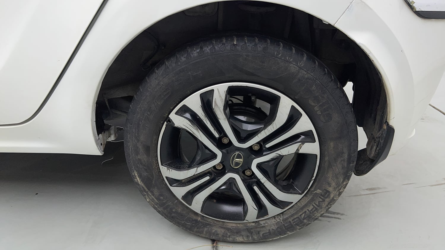 Used 2021 Tata Tiago XZ Petrol Manual tyres LEFT REAR TYRE RIM VIEW
