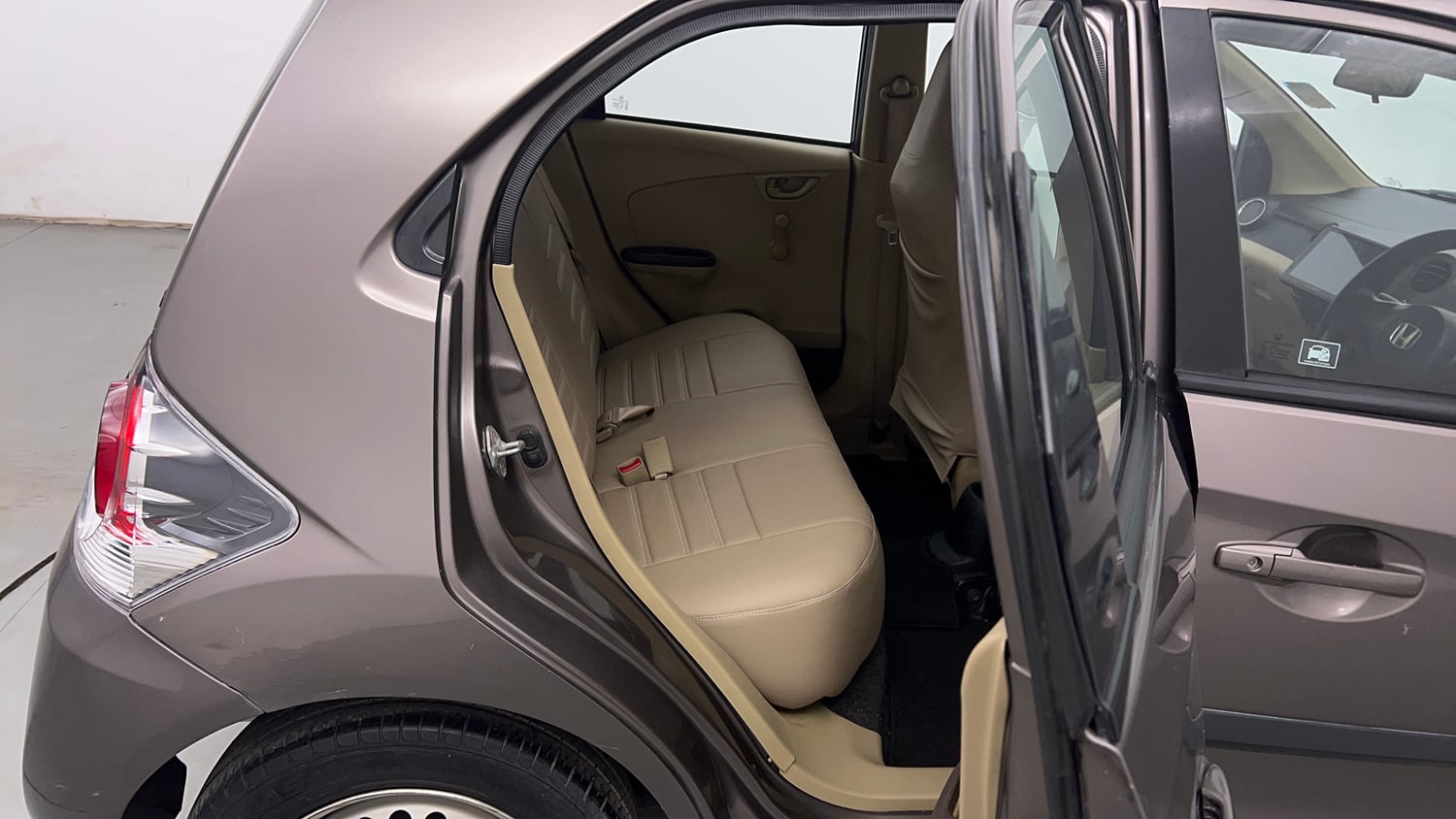 Used 2013 Honda Brio E MT Petrol Manual interior RIGHT SIDE REAR DOOR CABIN VIEW