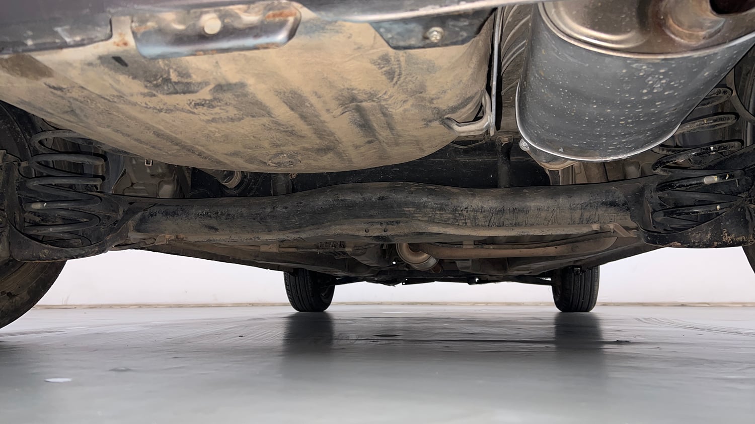 Used 2013 Honda Brio E MT Petrol Manual extra REAR UNDERBODY VIEW (TAKEN FROM REAR)
