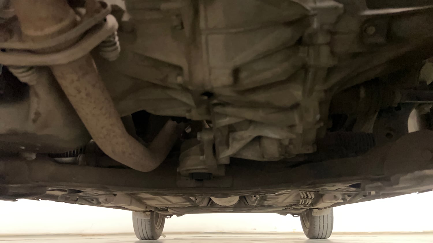 Used 2017 Maruti Suzuki Dzire ZXi AMT Petrol Automatic extra FRONT LEFT UNDERBODY VIEW