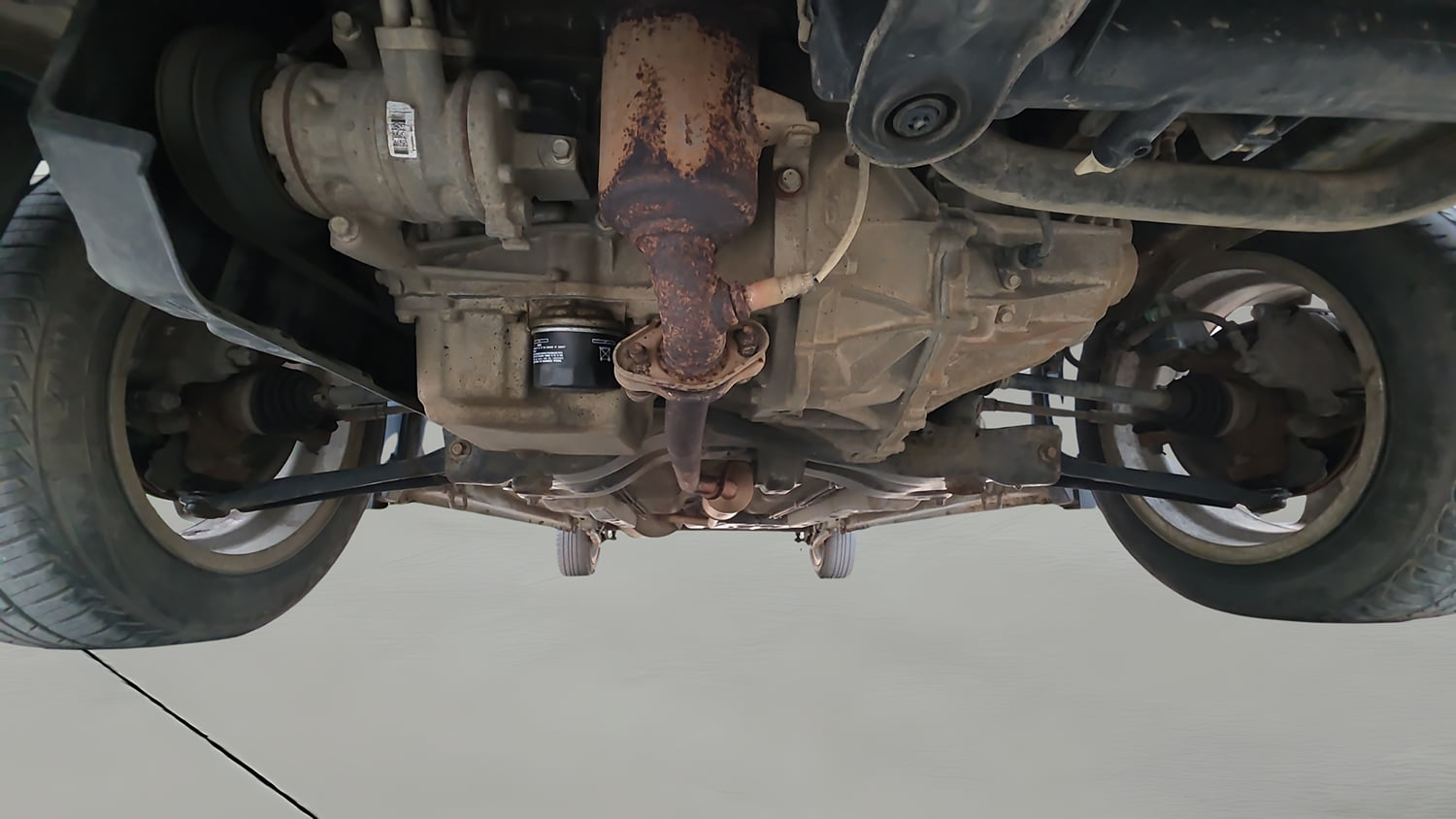 Used 2017 Maruti Suzuki Wagon R 1.0 VXI AMT Petrol Automatic extra FRONT LEFT UNDERBODY VIEW