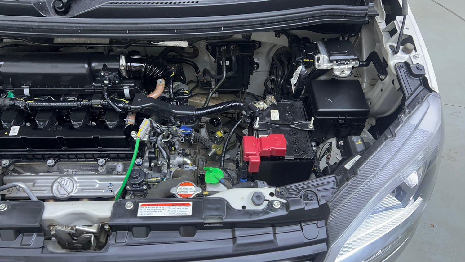 Used 2024 Maruti Suzuki Wagon R ZXI 1.2 Petrol Manual engine ENGINE LEFT SIDE VIEW