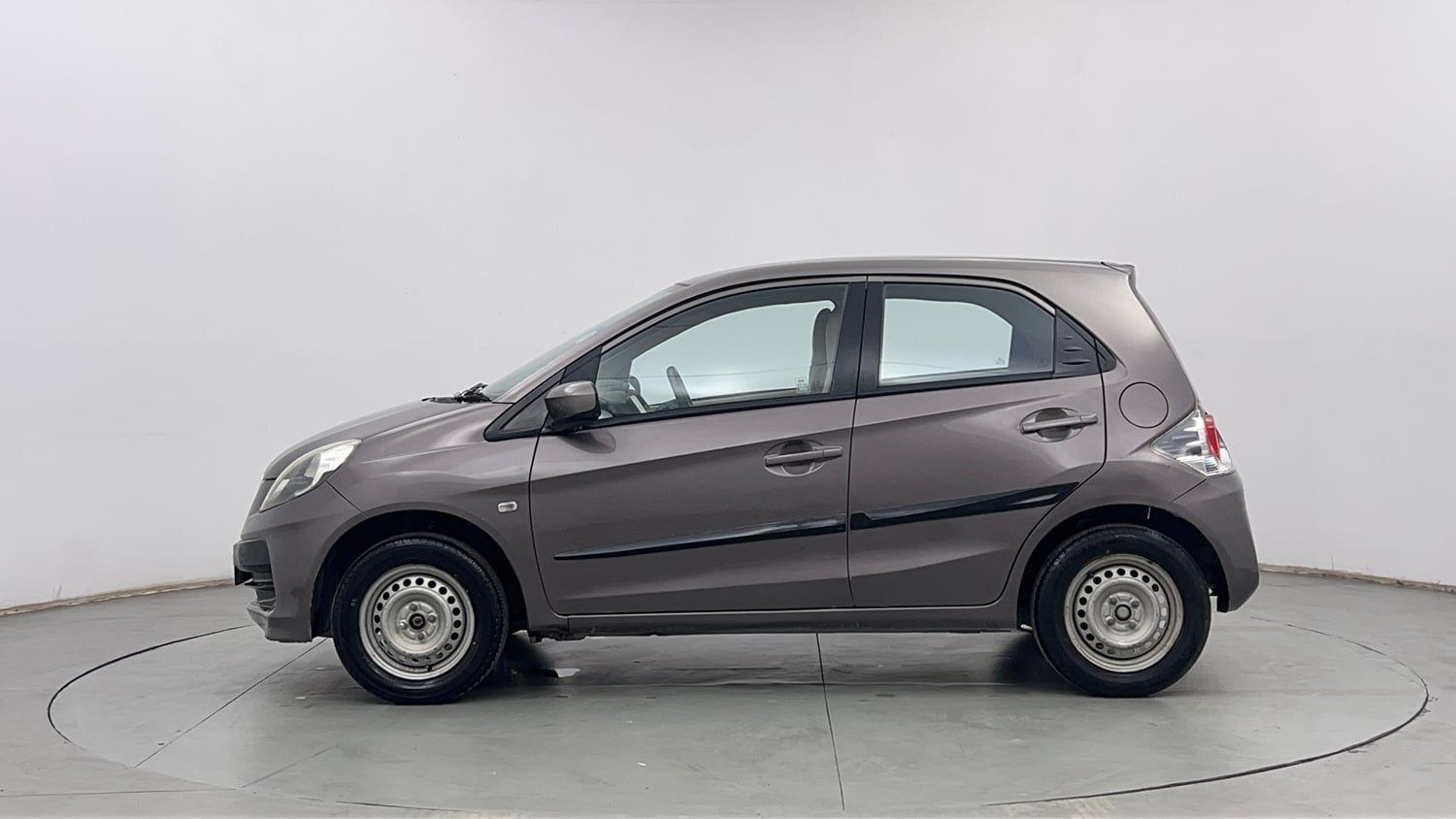 Used 2013 Honda Brio E MT Petrol Manual exterior LEFT SIDE VIEW