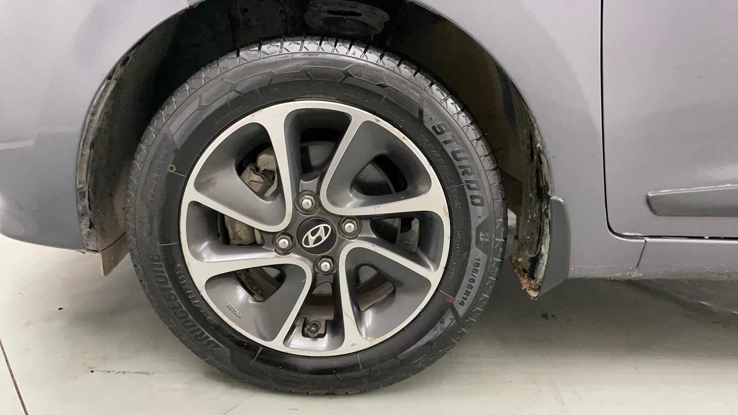 Used 2019 Hyundai Grand i10 Sportz AT 1.2 Kappa VTVT Petrol Automatic tyres LEFT FRONT TYRE RIM VIEW