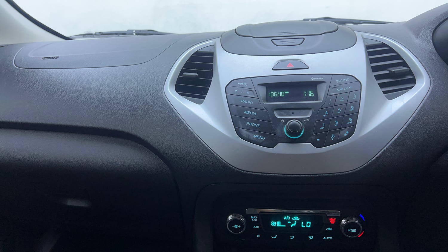 Used 2017 Ford Figo Titanium 1.2 Ti-VCT Petrol Manual interior MUSIC SYSTEM & AC CONTROL VIEW