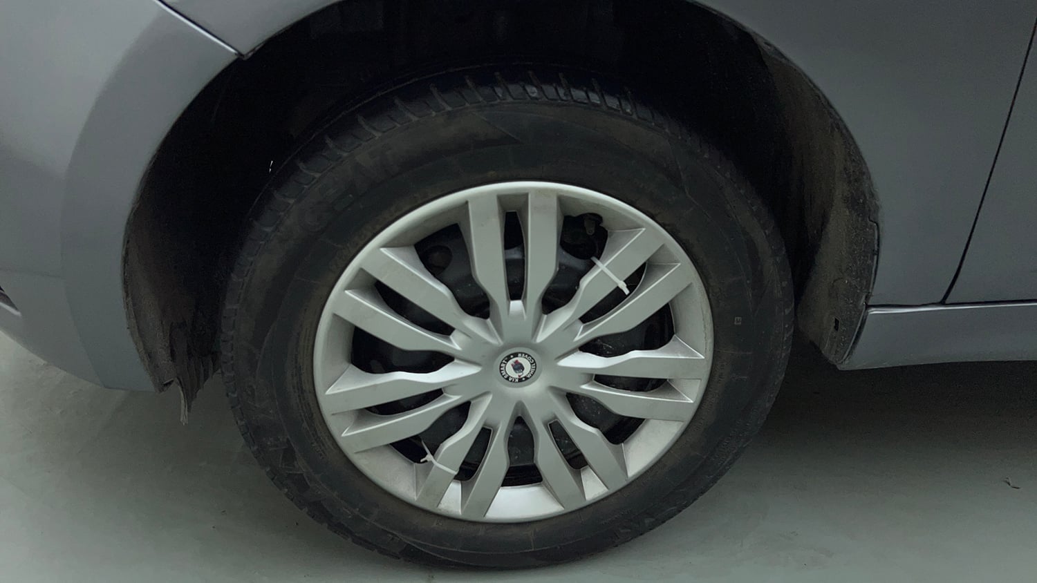 Used 2018 Tata Tiago Revotron XT Petrol Manual tyres LEFT FRONT TYRE RIM VIEW