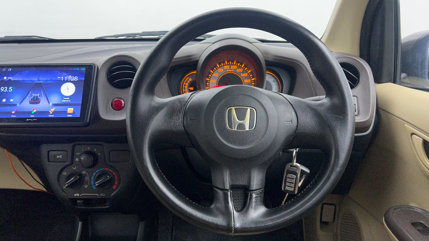 Used 2013 Honda Brio E MT Petrol Manual interior STEERING VIEW