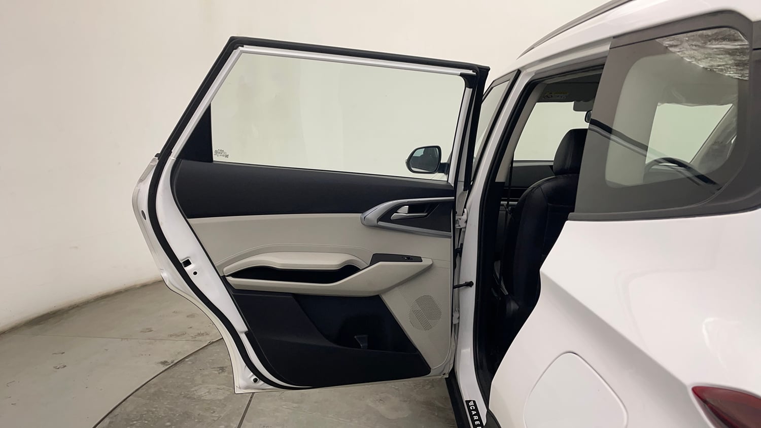Used 2022 Kia Carens Prestige 1.4 Petrol MT 7 STR Petrol Manual interior LEFT REAR DOOR OPEN VIEW