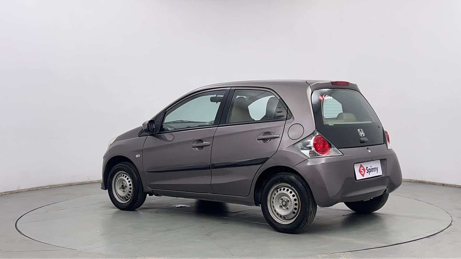 Used 2013 Honda Brio E MT Petrol Manual exterior LEFT REAR CORNER VIEW