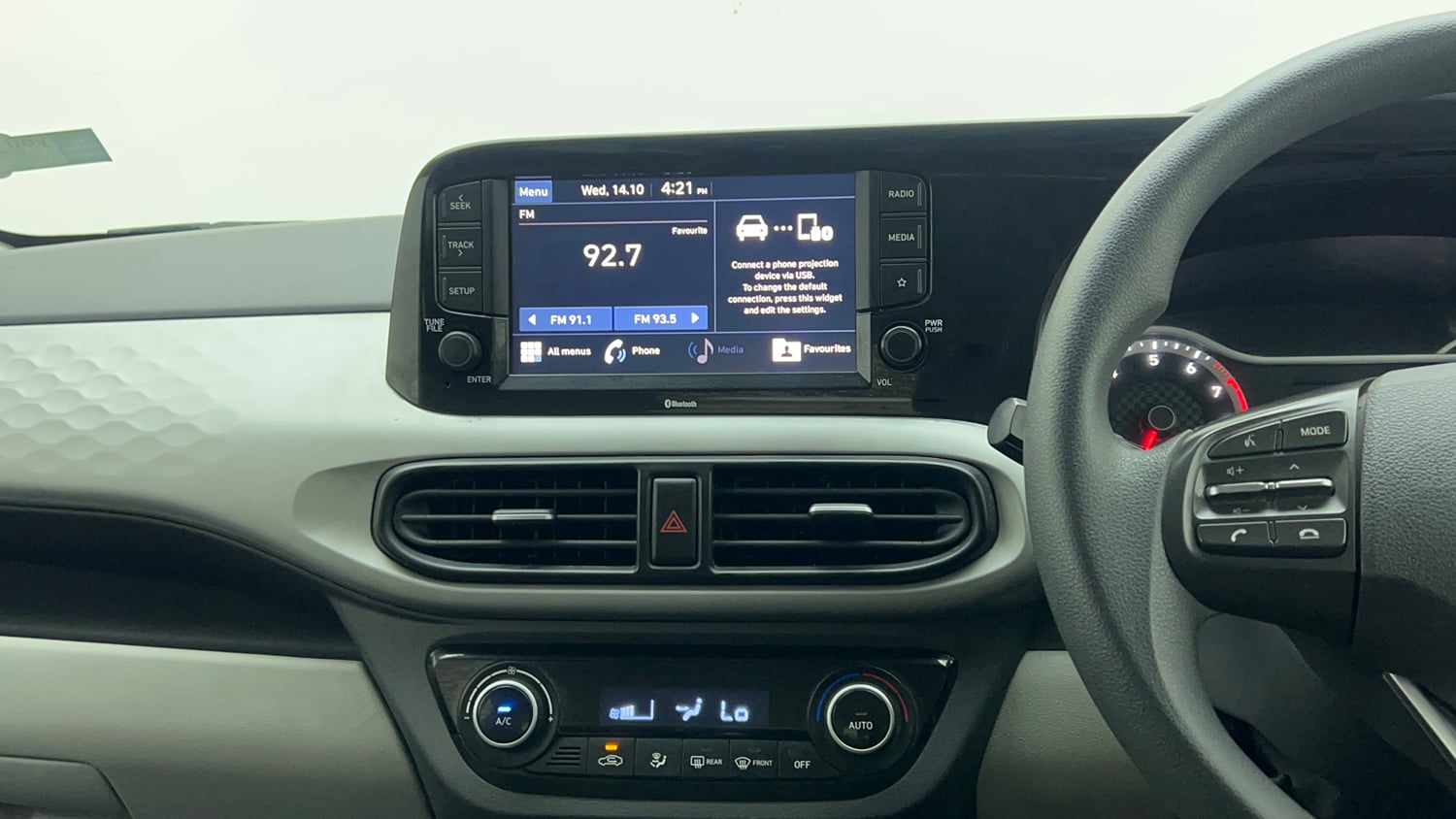 Used 2022 Hyundai Grand i10 Nios Sportz 1.2 Kappa VTVT Petrol Manual top_features Integrated (in-dash) music system
