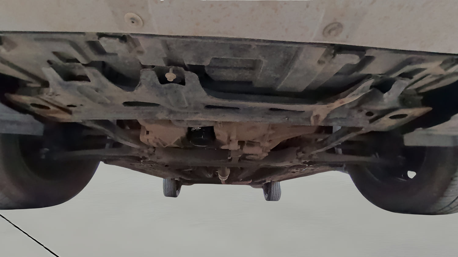 Used 2023 Nissan Magnite XL Petrol Manual extra FRONT LEFT UNDERBODY VIEW