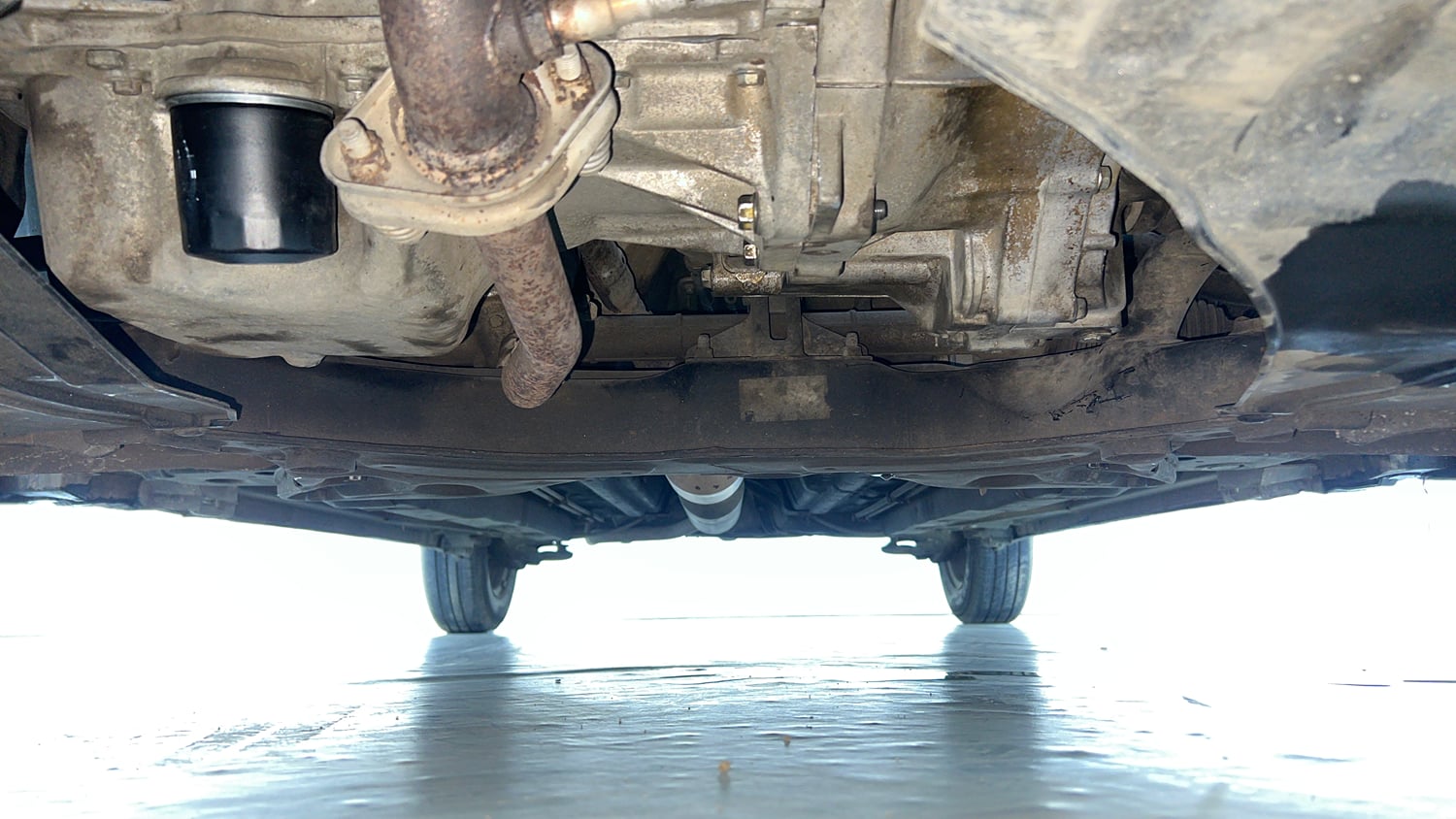Used 2015 Maruti Suzuki Swift Dzire VXI Petrol Manual extra FRONT LEFT UNDERBODY VIEW