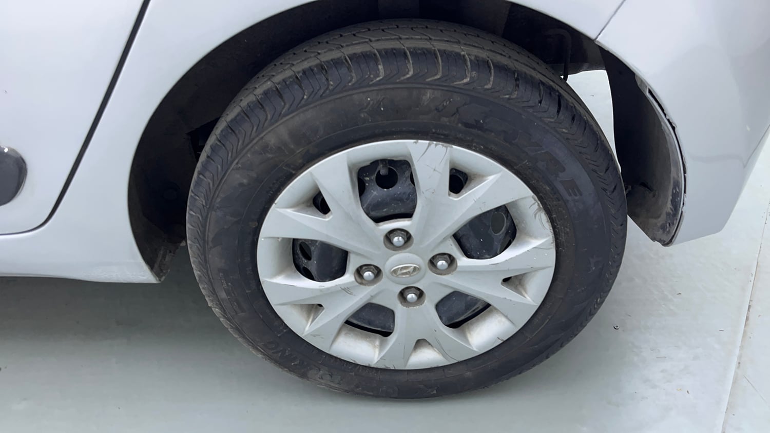 Used 2016 Hyundai Grand i10 Sportz 1.2 Kappa VTVT Petrol Manual tyres LEFT REAR TYRE RIM VIEW
