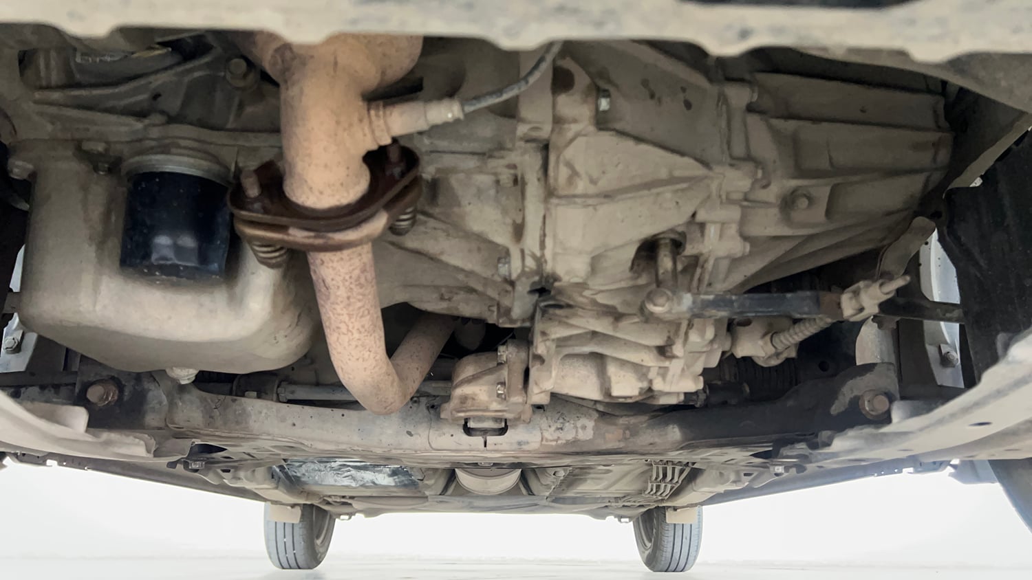Used 2016 Maruti Suzuki Baleno Delta Petrol+CNG (Outside Fitted) Cng Manual extra FRONT LEFT UNDERBODY VIEW
