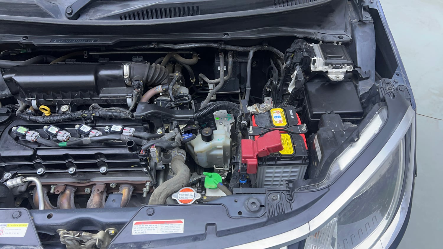 Used 2023 Maruti Suzuki Ignis Zeta 1.2 AMT Petrol Automatic engine ENGINE LEFT SIDE VIEW