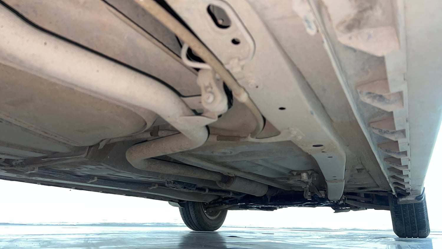 Used 2021 Maruti Suzuki XL6 Zeta MT Petrol Petrol Manual extra REAR RIGHT UNDERBODY VIEW