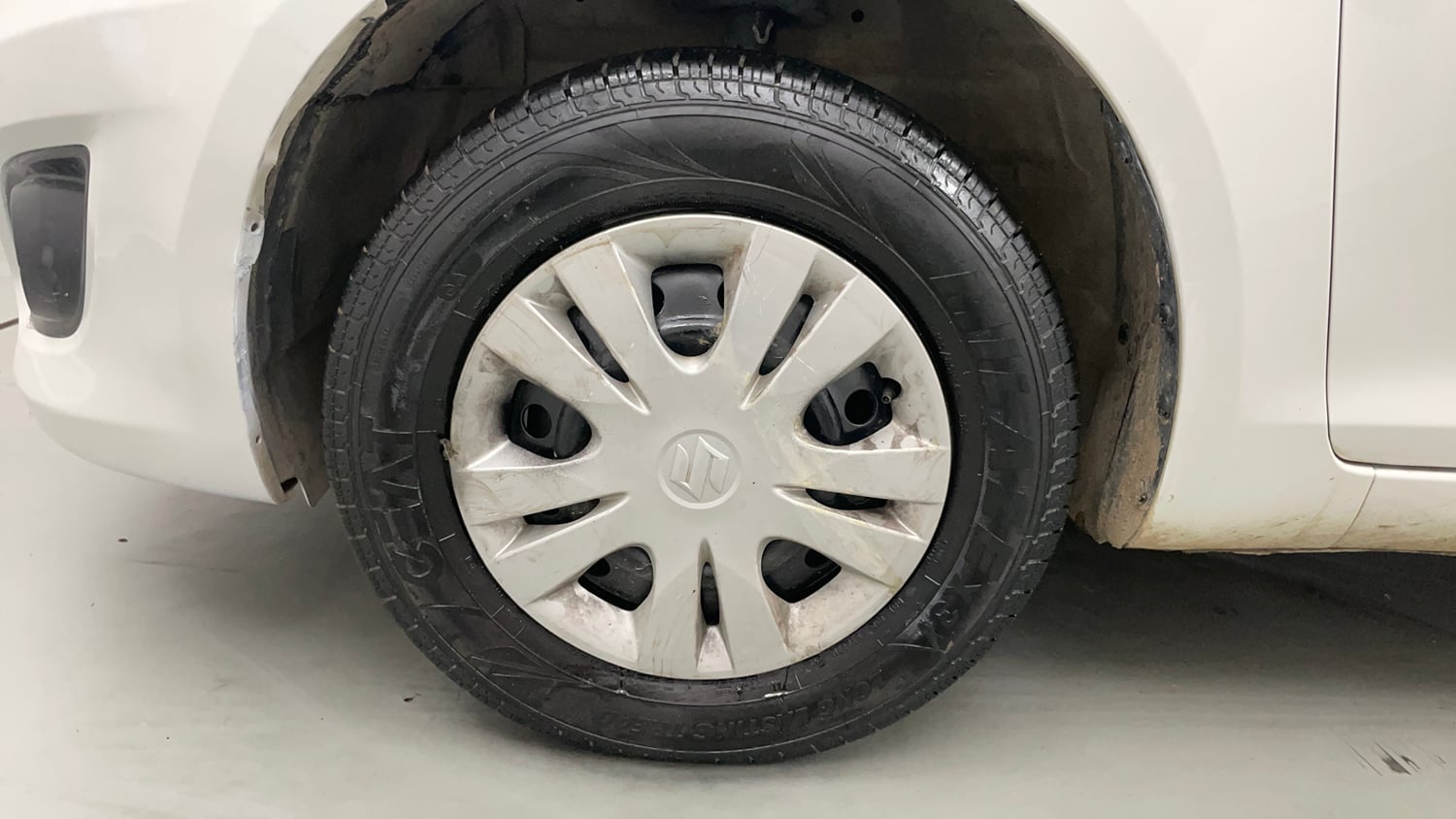 Used 2013 Maruti Suzuki Swift Dzire VXI Petrol Manual tyres LEFT FRONT TYRE RIM VIEW