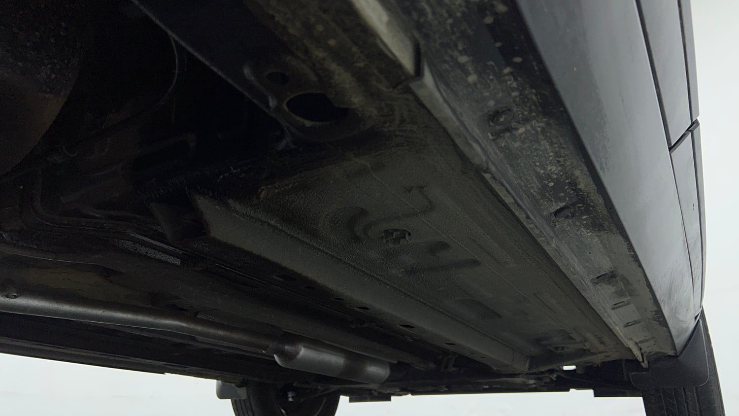 Used 2023 Nissan Magnite XE AMT Petrol Automatic extra REAR RIGHT UNDERBODY VIEW