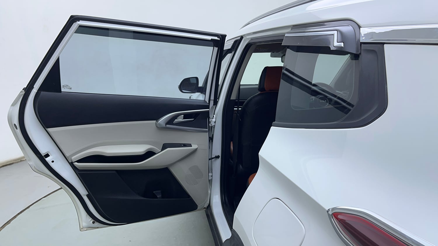 Used 2023 Kia Carens Prestige 1.5 Petrol 7 STR Petrol Manual interior LEFT REAR DOOR OPEN VIEW
