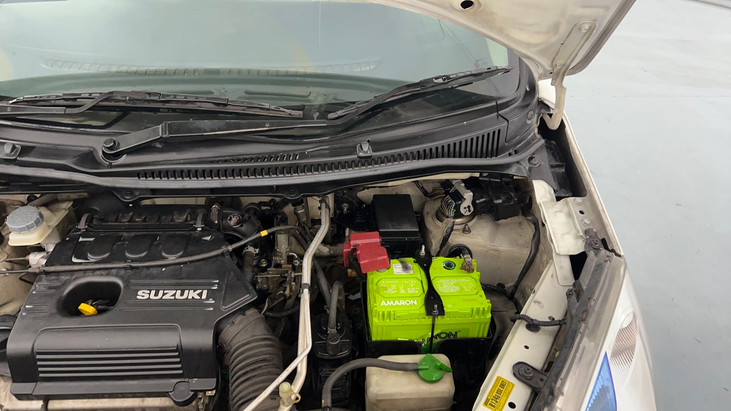 Used 2013 Maruti Suzuki Wagon R VXI Petrol Manual engine ENGINE LEFT SIDE HINGE & APRON VIEW