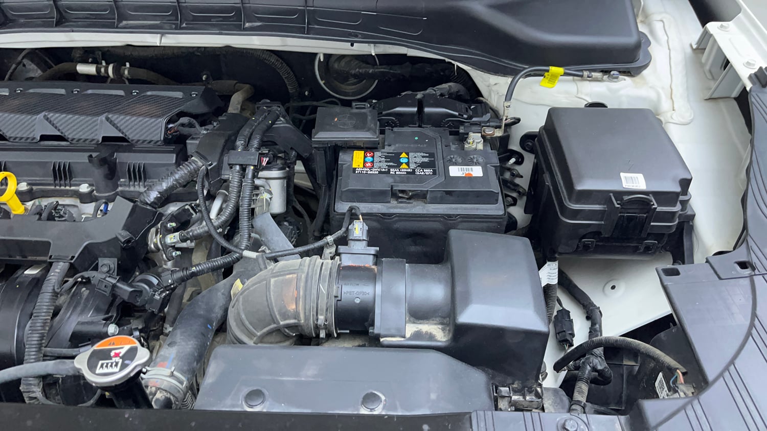 Used 2023 Kia Carens Prestige 1.5 Petrol 7 STR Petrol Manual engine ENGINE LEFT SIDE VIEW