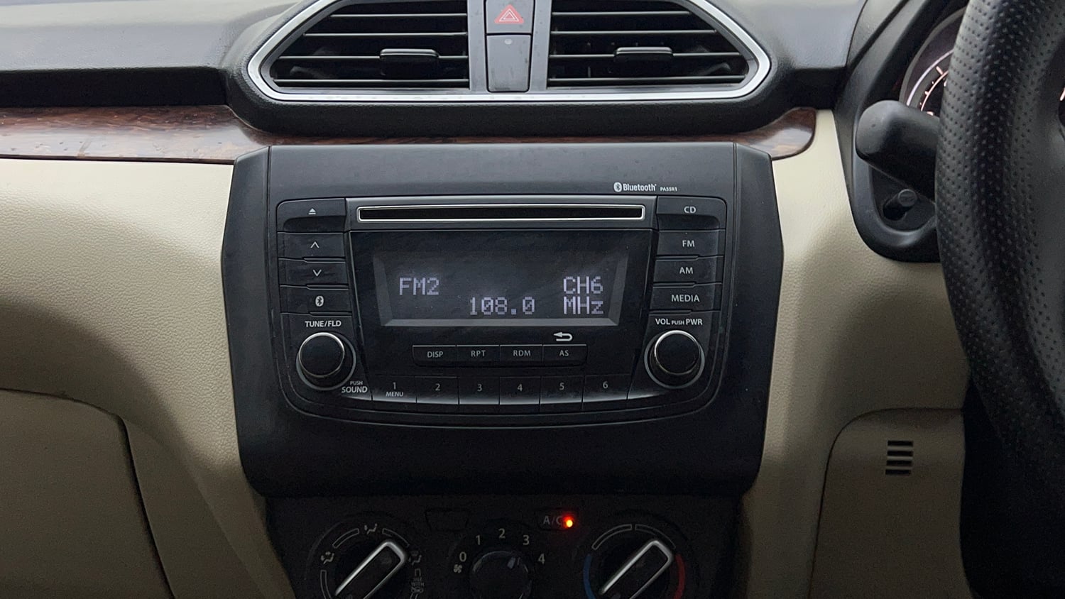 Used 2018 Maruti Suzuki Dzire VXi AMT Petrol Automatic top_features Integrated (in-dash) music system