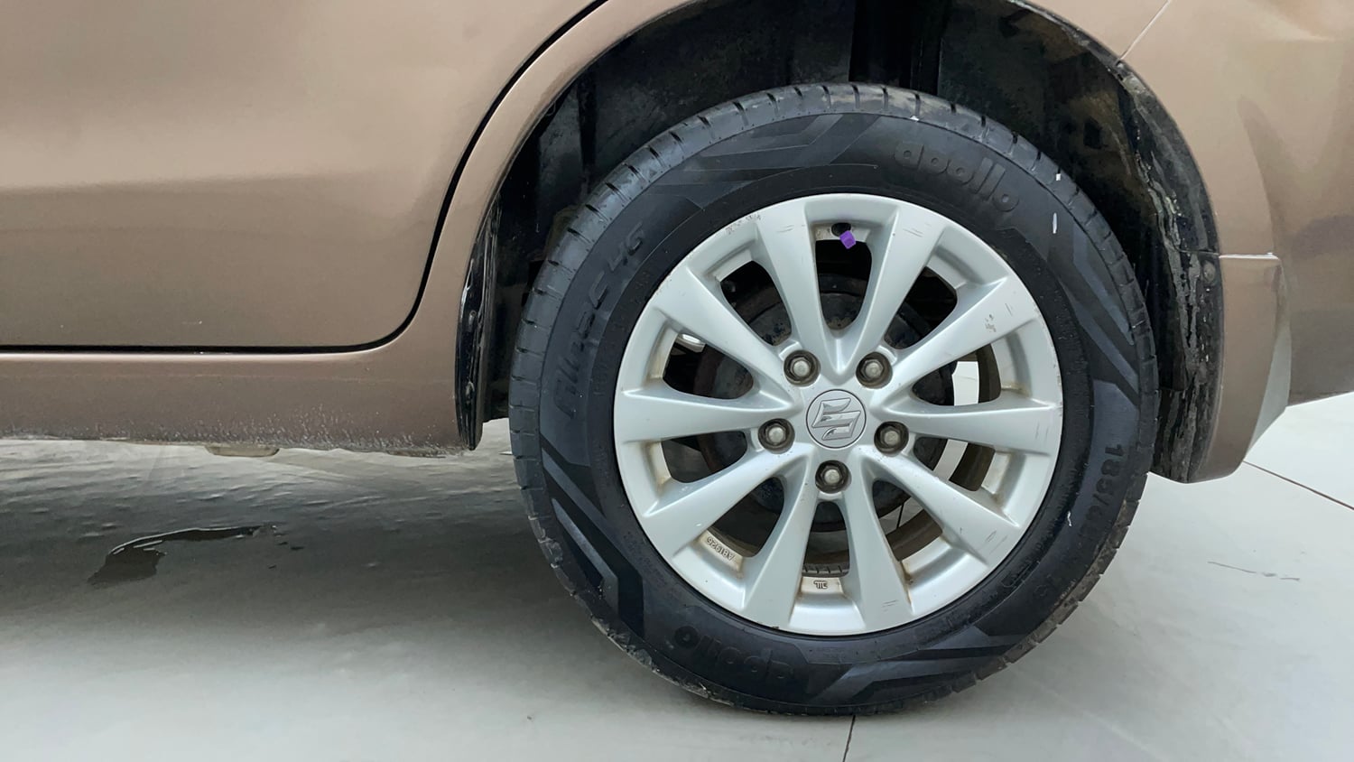 Used 2015 Maruti Suzuki Ertiga ZXi Petrol Manual tyres LEFT REAR TYRE RIM VIEW