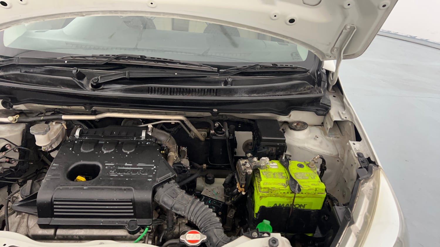 Used 2017 Maruti Suzuki Celerio VXi AMT Petrol Automatic engine ENGINE LEFT SIDE HINGE & APRON VIEW