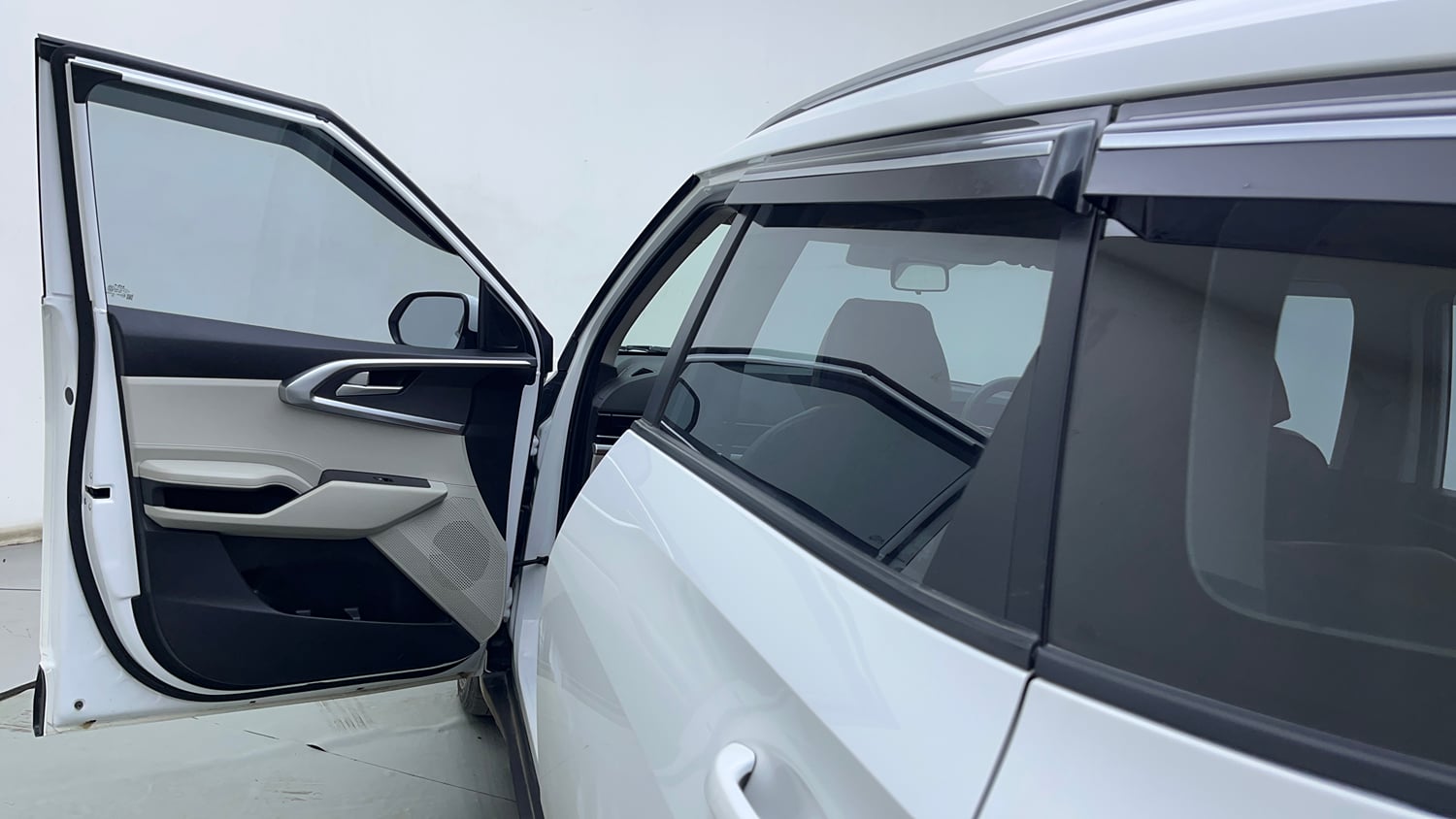 Used 2023 Kia Carens Prestige 1.5 Petrol 7 STR Petrol Manual interior LEFT FRONT DOOR OPEN VIEW