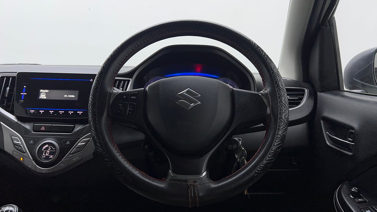 Used 2021 Maruti Suzuki Baleno Delta Petrol Manual interior STEERING VIEW