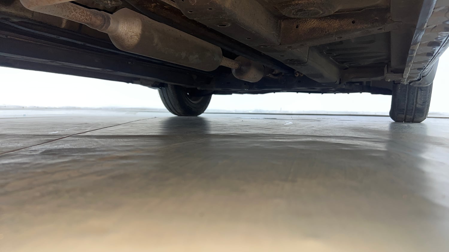 Used 2015 Maruti Suzuki Swift Dzire VXI Petrol Manual extra REAR RIGHT UNDERBODY VIEW