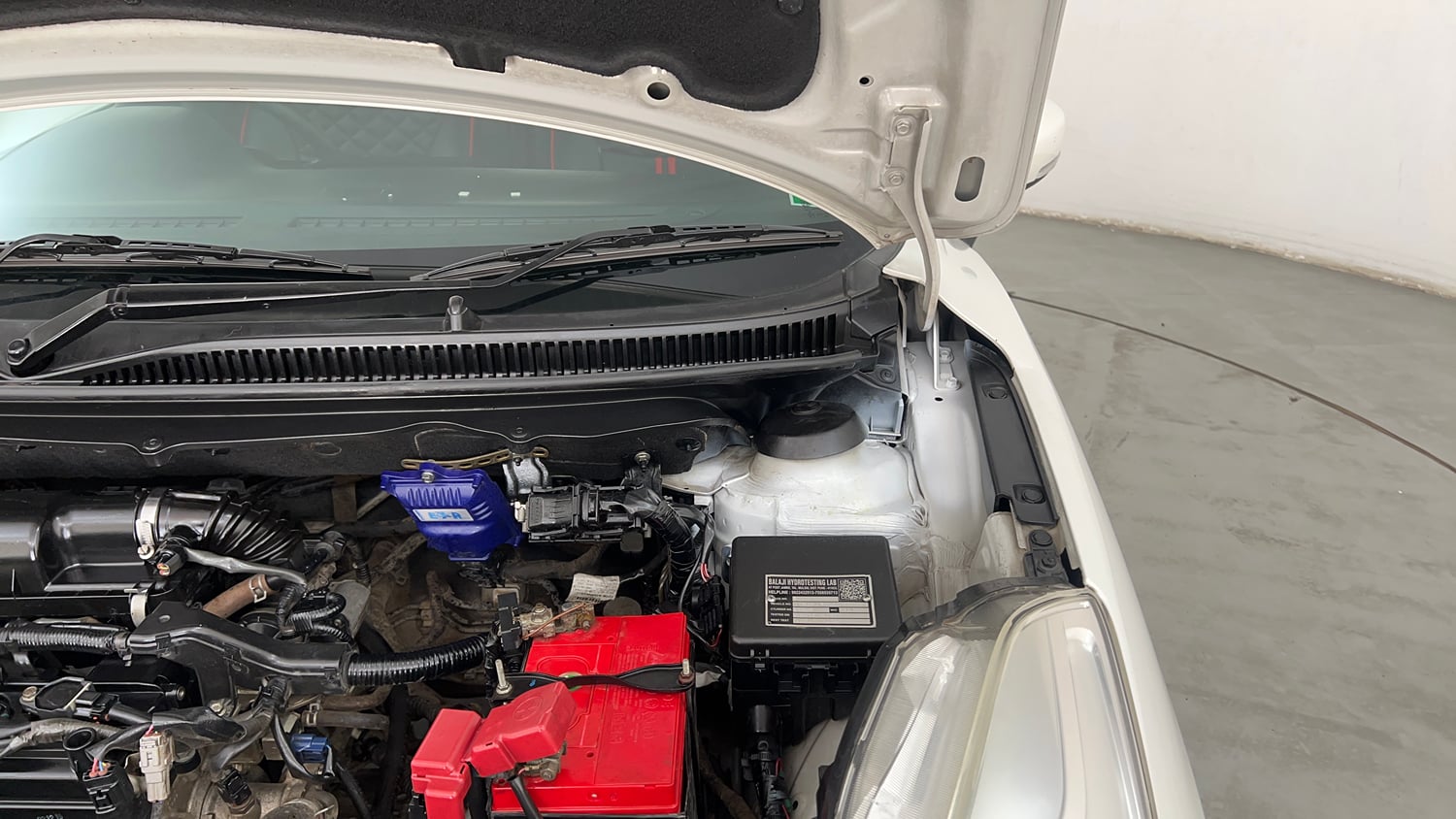 Used 2016 Maruti Suzuki Baleno Delta Petrol+CNG (Outside Fitted) Cng Manual engine ENGINE LEFT SIDE HINGE & APRON VIEW