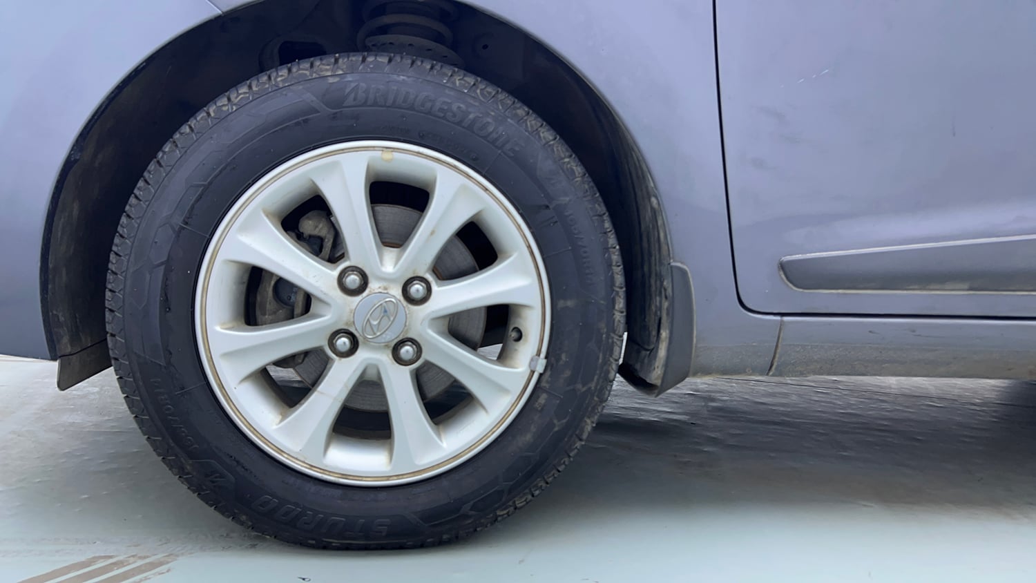 Used 2015 Hyundai Grand i10 Asta AT 1.2 Kappa VTVT Petrol Automatic tyres LEFT FRONT TYRE RIM VIEW