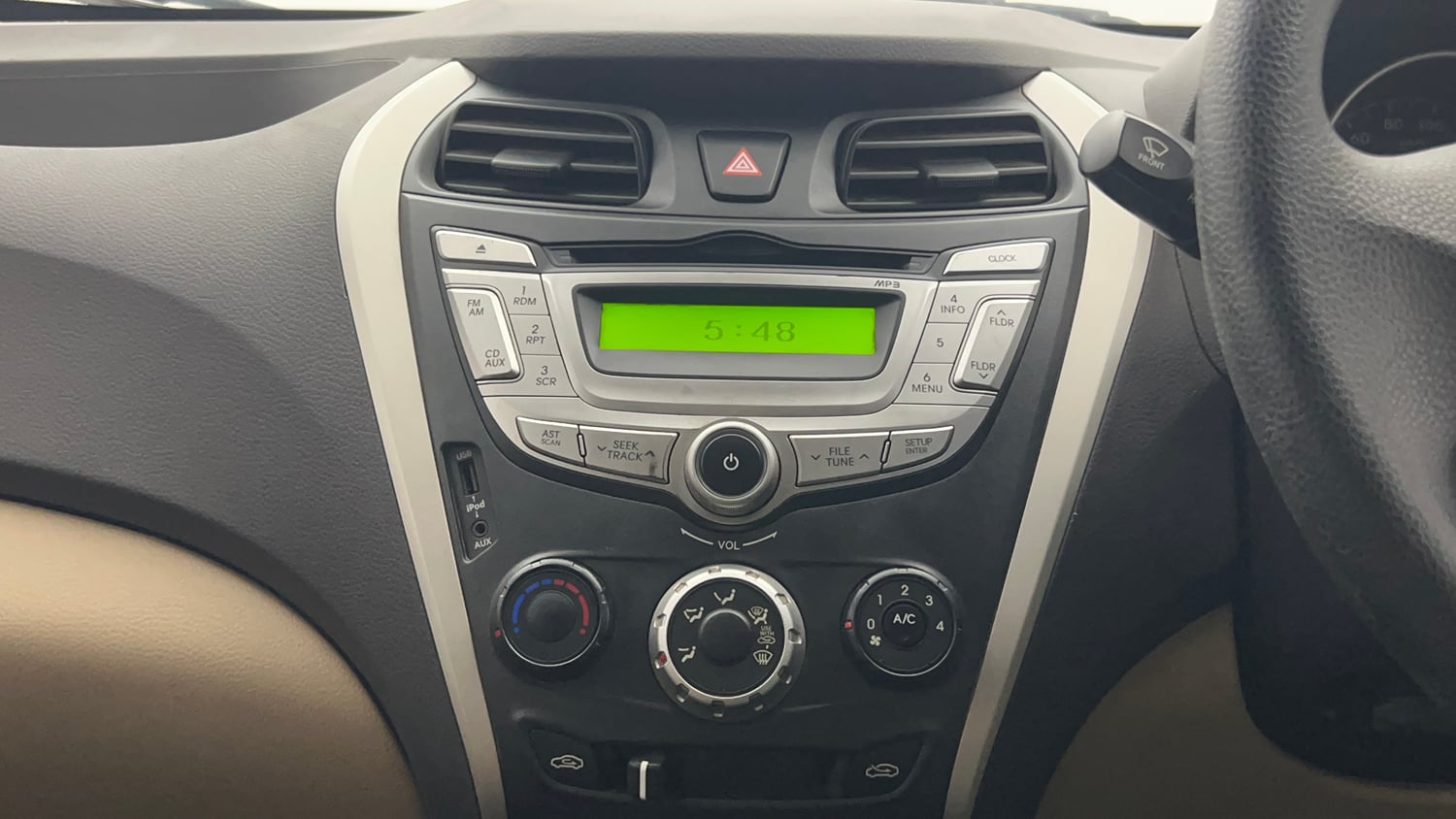 Used 2016 Hyundai Eon Magna + Petrol Manual top_features Integrated (in-dash) music system