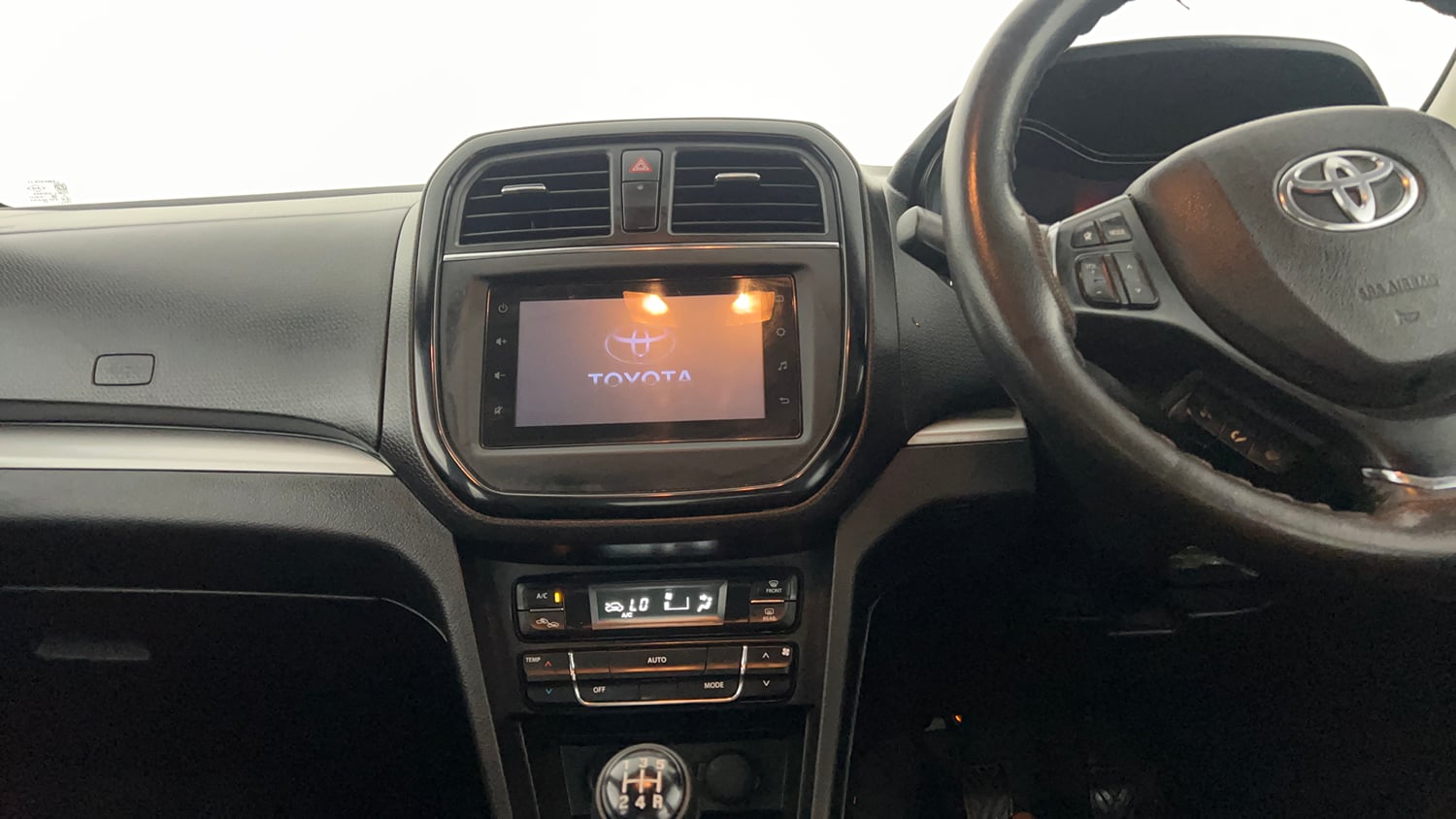 Used 2022 Toyota Urban Cruiser Premium Grade MT Petrol Manual interior MUSIC SYSTEM & AC CONTROL VIEW