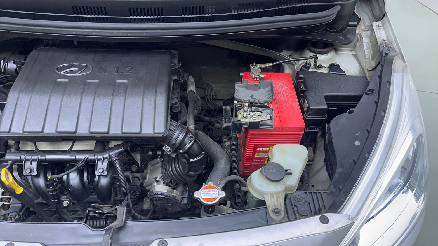 Used 2016 Hyundai Grand i10 Sportz 1.2 Kappa VTVT Petrol Manual engine ENGINE LEFT SIDE VIEW