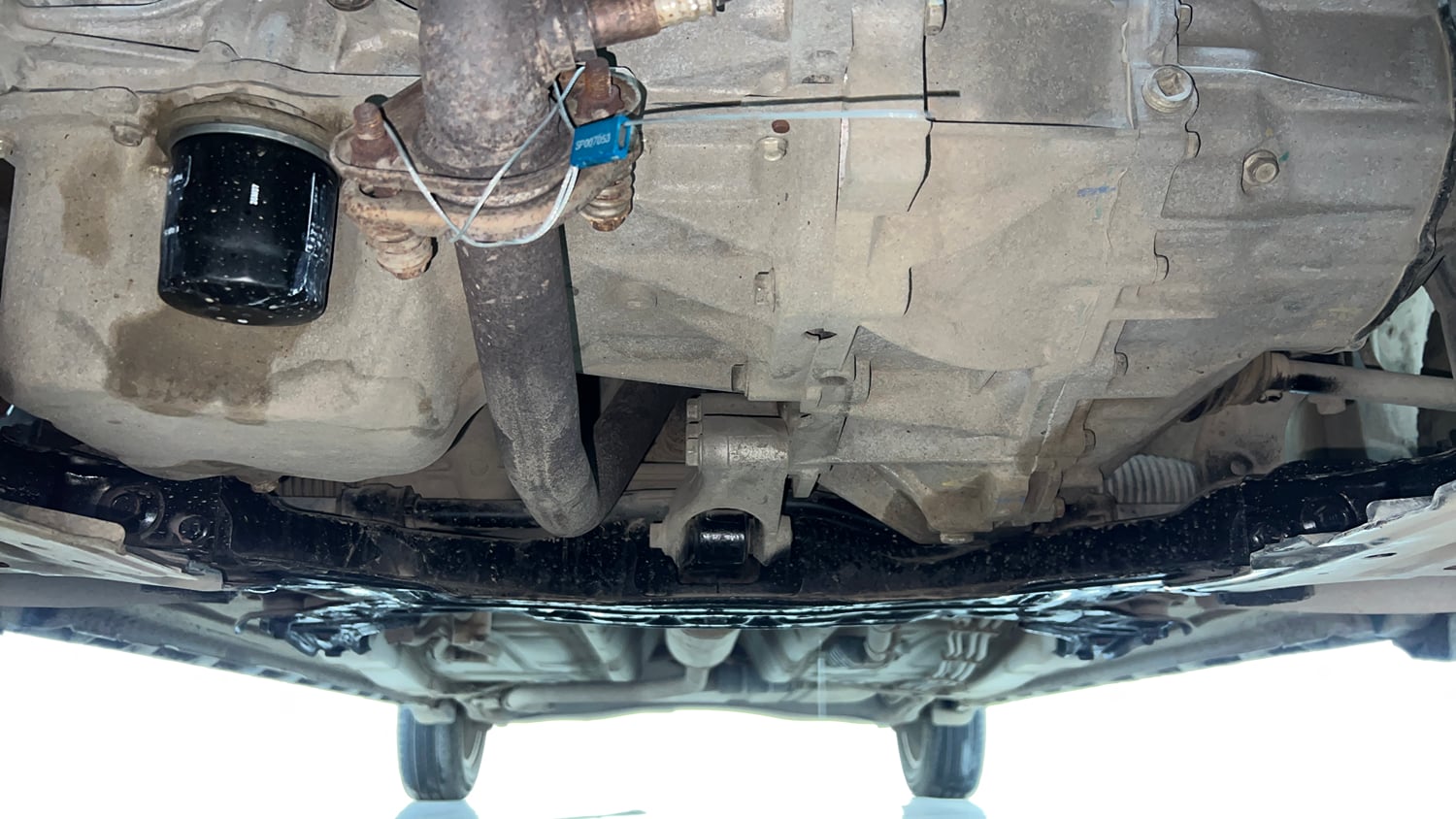 Used 2021 Maruti Suzuki XL6 Zeta MT Petrol Petrol Manual extra FRONT LEFT UNDERBODY VIEW