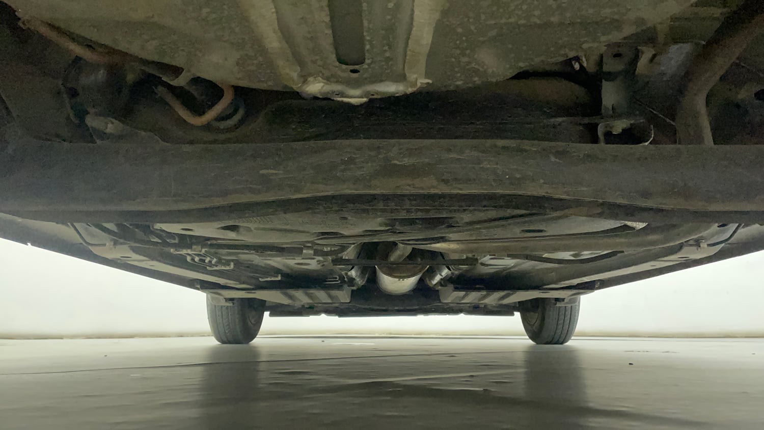 Used 2026 Maruti Suzuki Swift VXi (O) AMT Petrol Automatic extra REAR UNDERBODY VIEW (TAKEN FROM REAR)