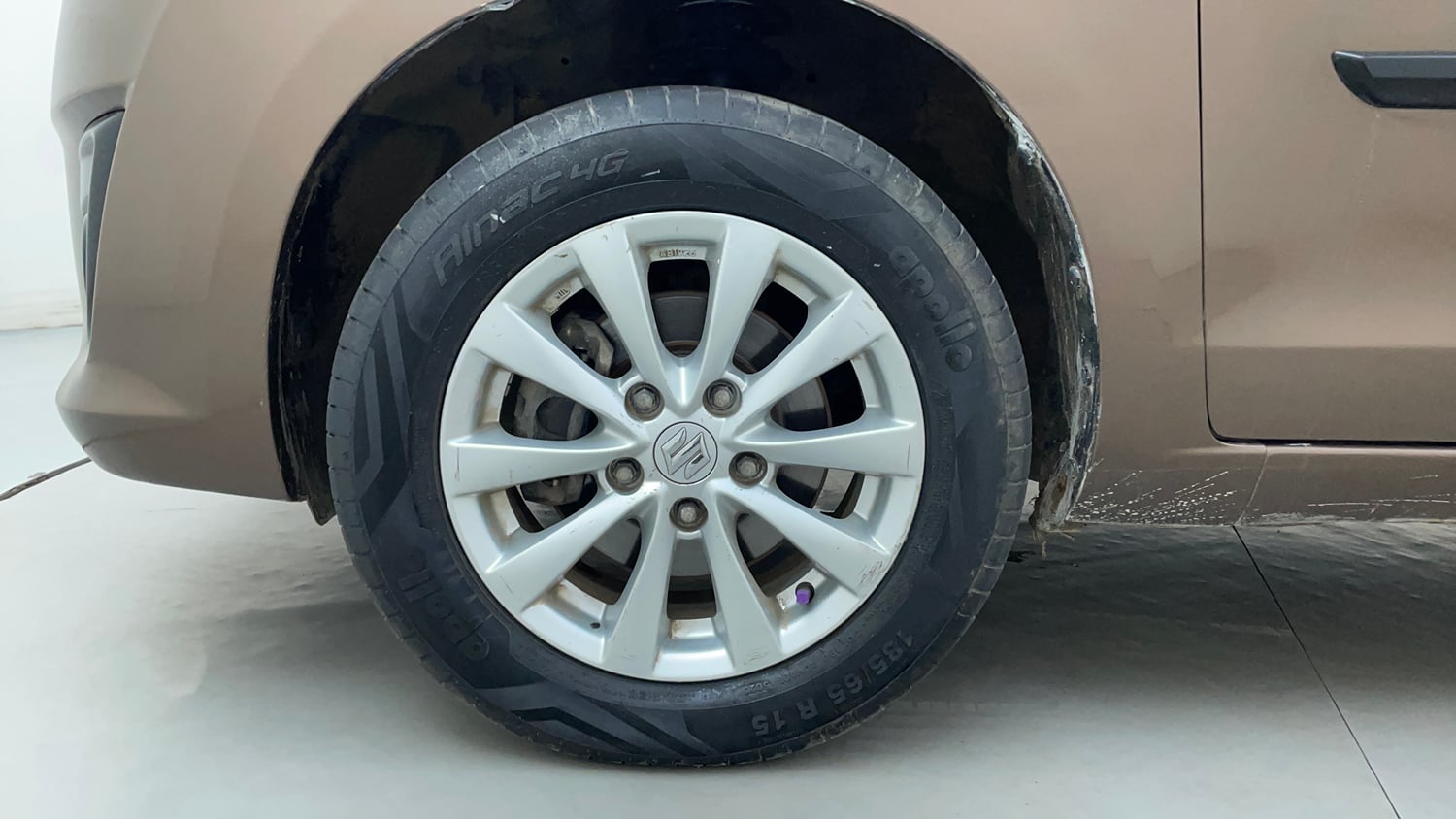 Used 2015 Maruti Suzuki Ertiga ZXi Petrol Manual tyres LEFT FRONT TYRE RIM VIEW