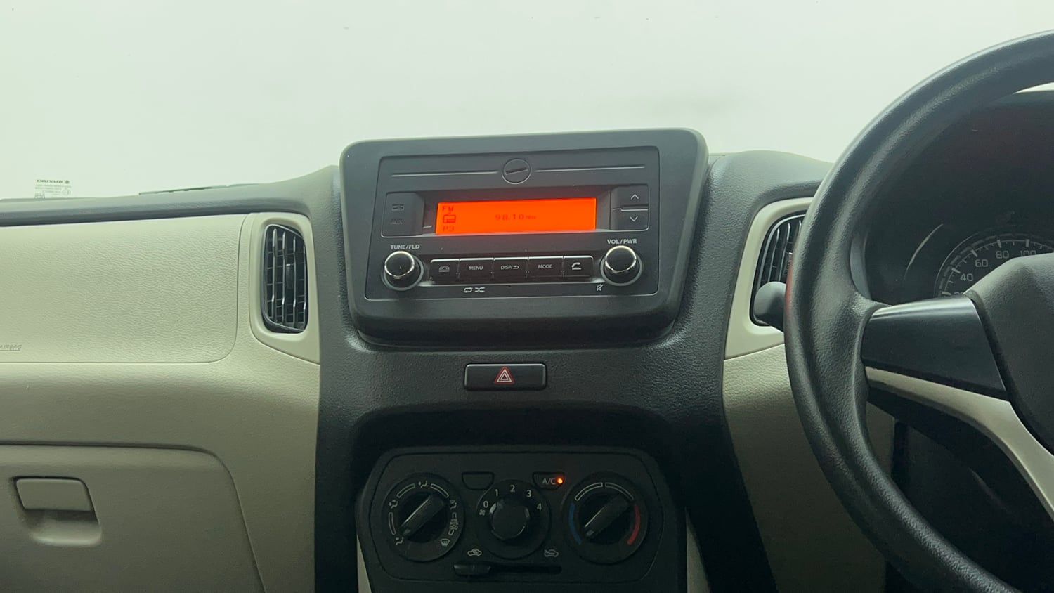 Used 2023 Maruti Suzuki Wagon R VXI 1.0 Petrol Manual top_features Integrated (in-dash) music system