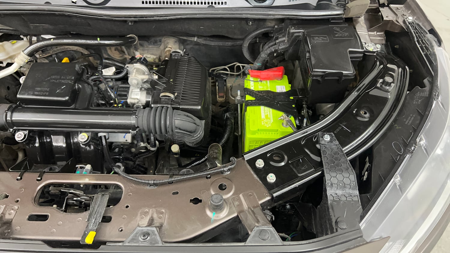 Used 2023 Nissan Magnite XE Petrol Manual engine ENGINE LEFT SIDE VIEW