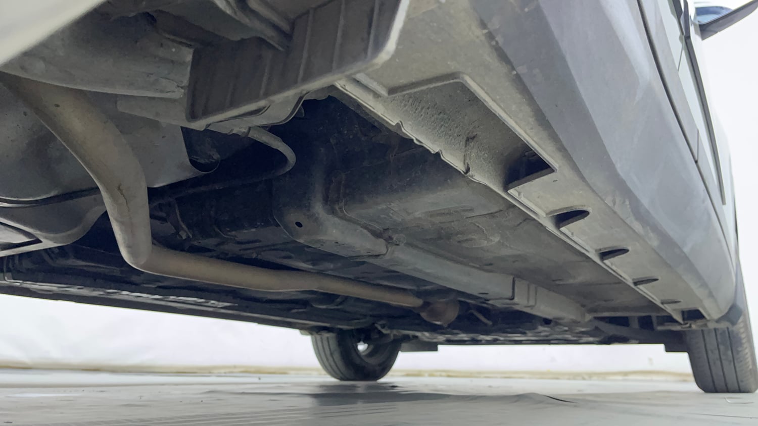 Used 2024 Hyundai Exter SX 1.2 MT Dual Tone Petrol Manual extra REAR RIGHT UNDERBODY VIEW