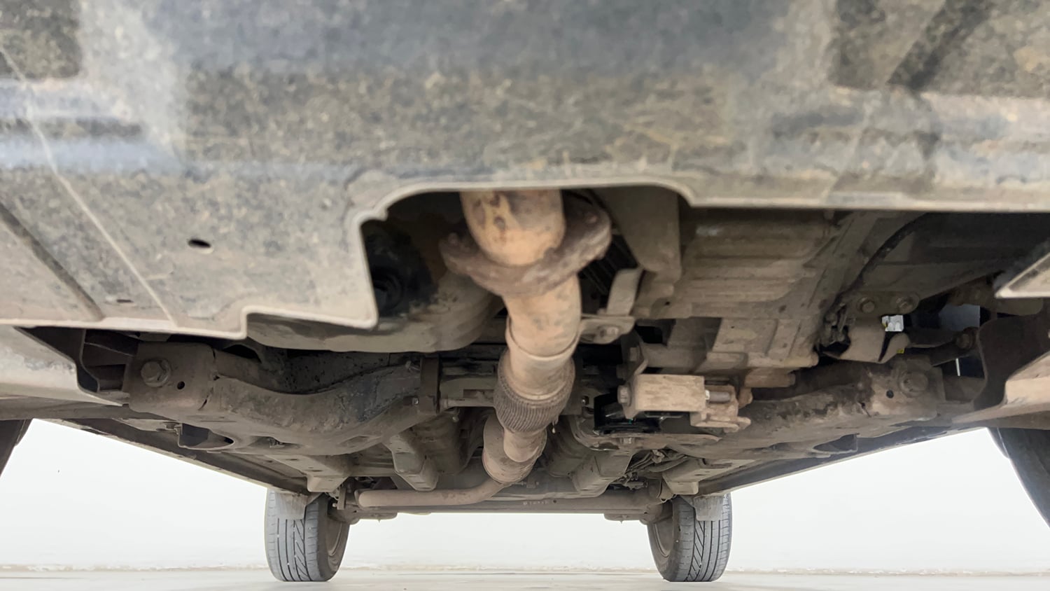 Used 2022 Tata Nexon Kaziranga XZA Plus (Premium) Petrol Automatic extra FRONT LEFT UNDERBODY VIEW