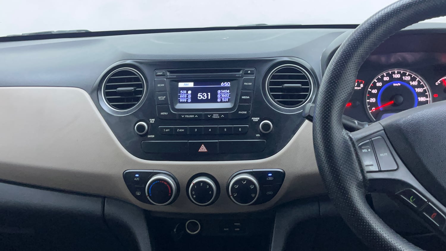 Used 2016 Hyundai Grand i10 Sportz 1.2 Kappa VTVT Petrol Manual interior MUSIC SYSTEM & AC CONTROL VIEW