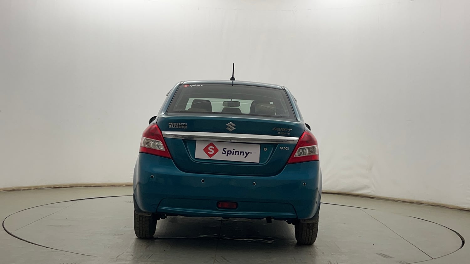Used 2013 Maruti Suzuki Swift Dzire VXI Petrol Manual exterior BACK VIEW