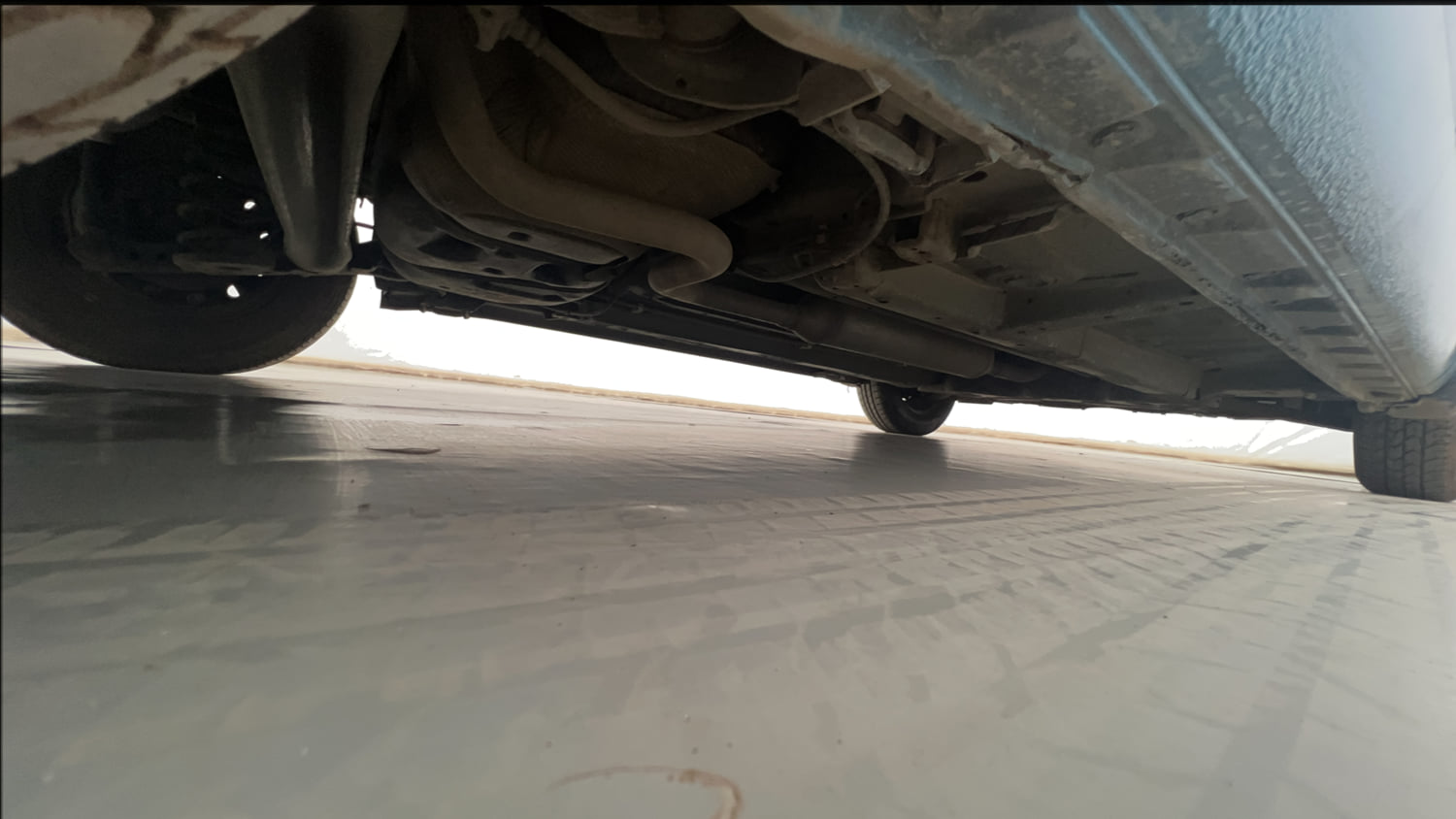 Used 2013 Maruti Suzuki Swift Dzire VXI Petrol Manual extra REAR RIGHT UNDERBODY VIEW