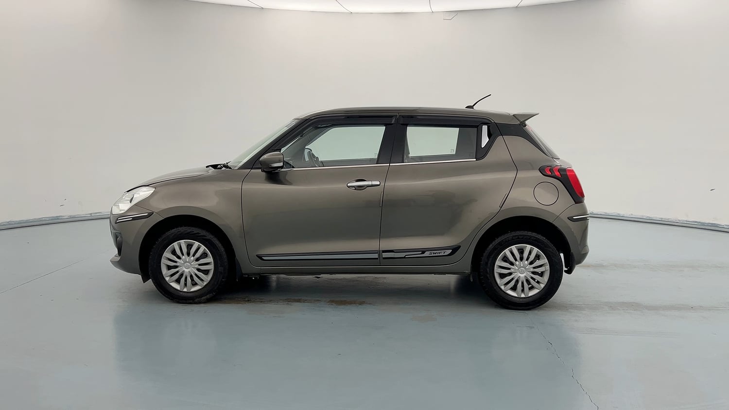 Used 2022 Maruti Suzuki Swift VXi Petrol Manual exterior LEFT SIDE VIEW