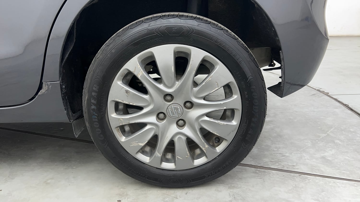 Used 2017 Maruti Suzuki Baleno Alpha 1.2 Petrol Manual tyres LEFT REAR TYRE RIM VIEW
