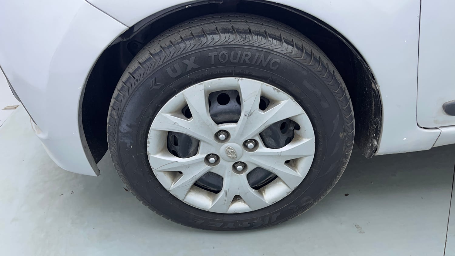 Used 2016 Hyundai Grand i10 Sportz 1.2 Kappa VTVT Petrol Manual tyres LEFT FRONT TYRE RIM VIEW